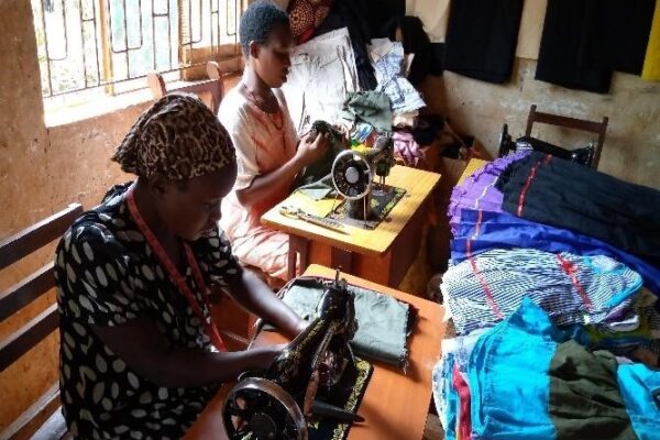 Nakafero Josephine and her trainee student during cloth resizing in Buloba Village, Buikwe district 1
