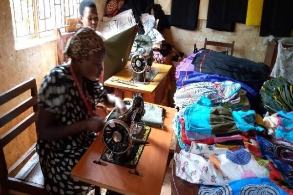 Nakafero Josephine and her trainee student during cloth resizing in Buloba Village, Buikwe district 2